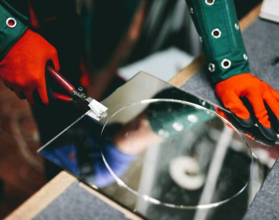 glazier-worker-cutting-glass-with-compass-glass-cu-2026-01-09-08-14-06-utc (1)