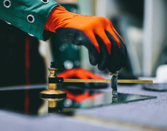 glazier-worker-cutting-glass-with-compass-glass-cu-2026-01-09-11-18-16-utc (1)